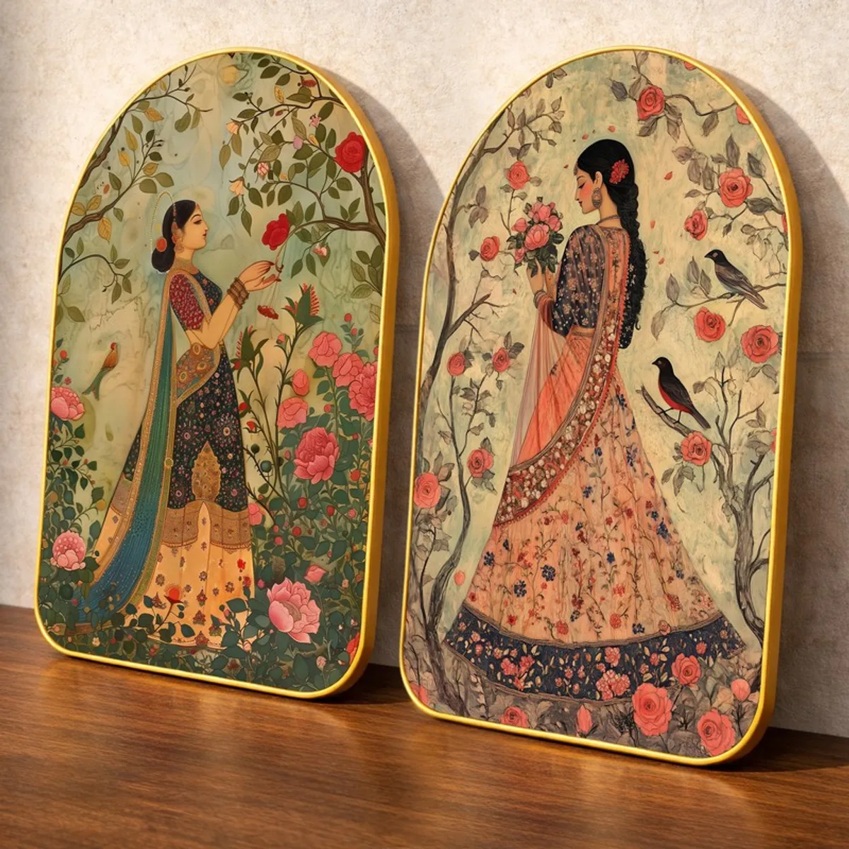 Close view of two arched wall art panels with floral Mughal-style illustrations