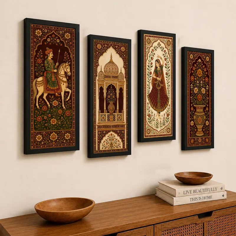 Set of four framed Mughal-style wall paintings displayed above a wooden console.