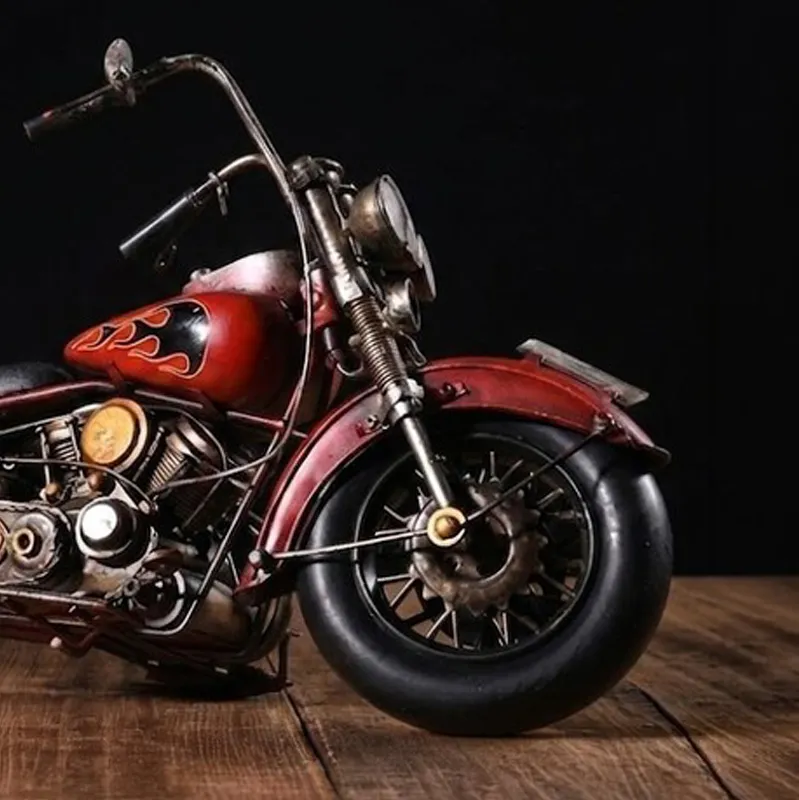 Close-up of the front wheel and handlebar of the motorcycle showpiece