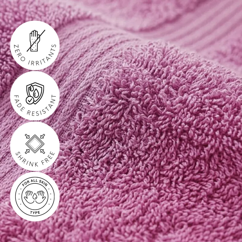 Close-up of pink towel texture with circular feature icons