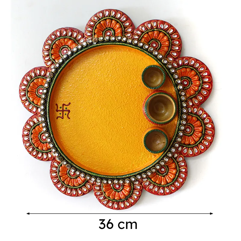 Yellow handcrafted pooja plate with floral border and three bowls, shown with width marker