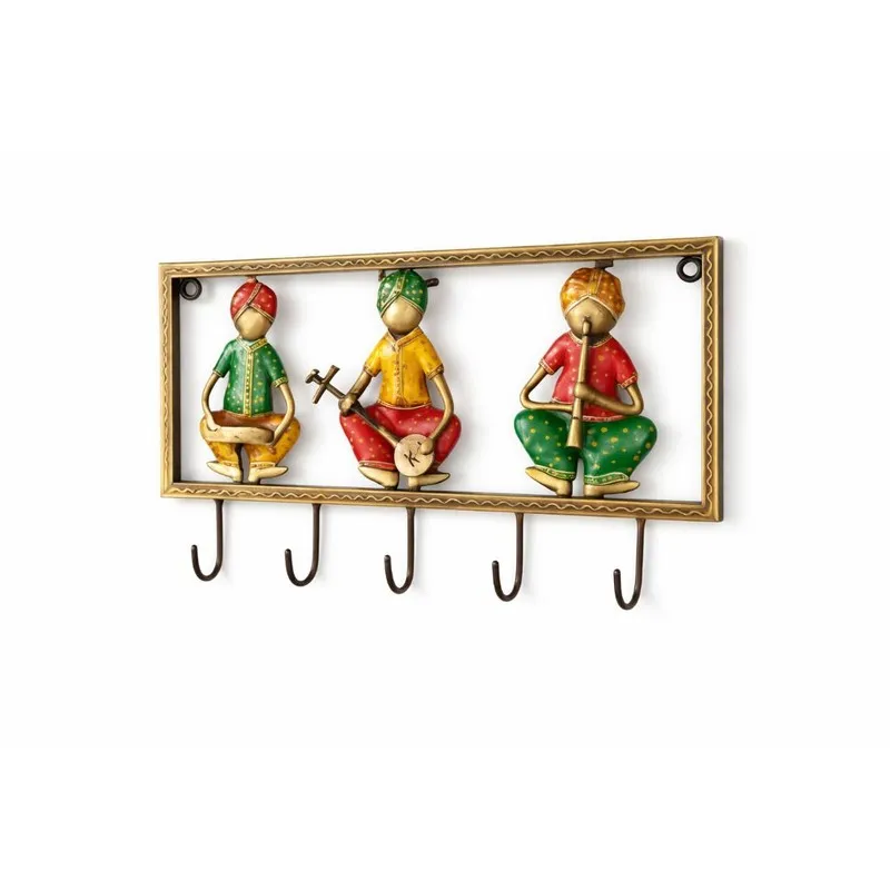 Decorative metal hooks and key holder with three figurines and five hooks
