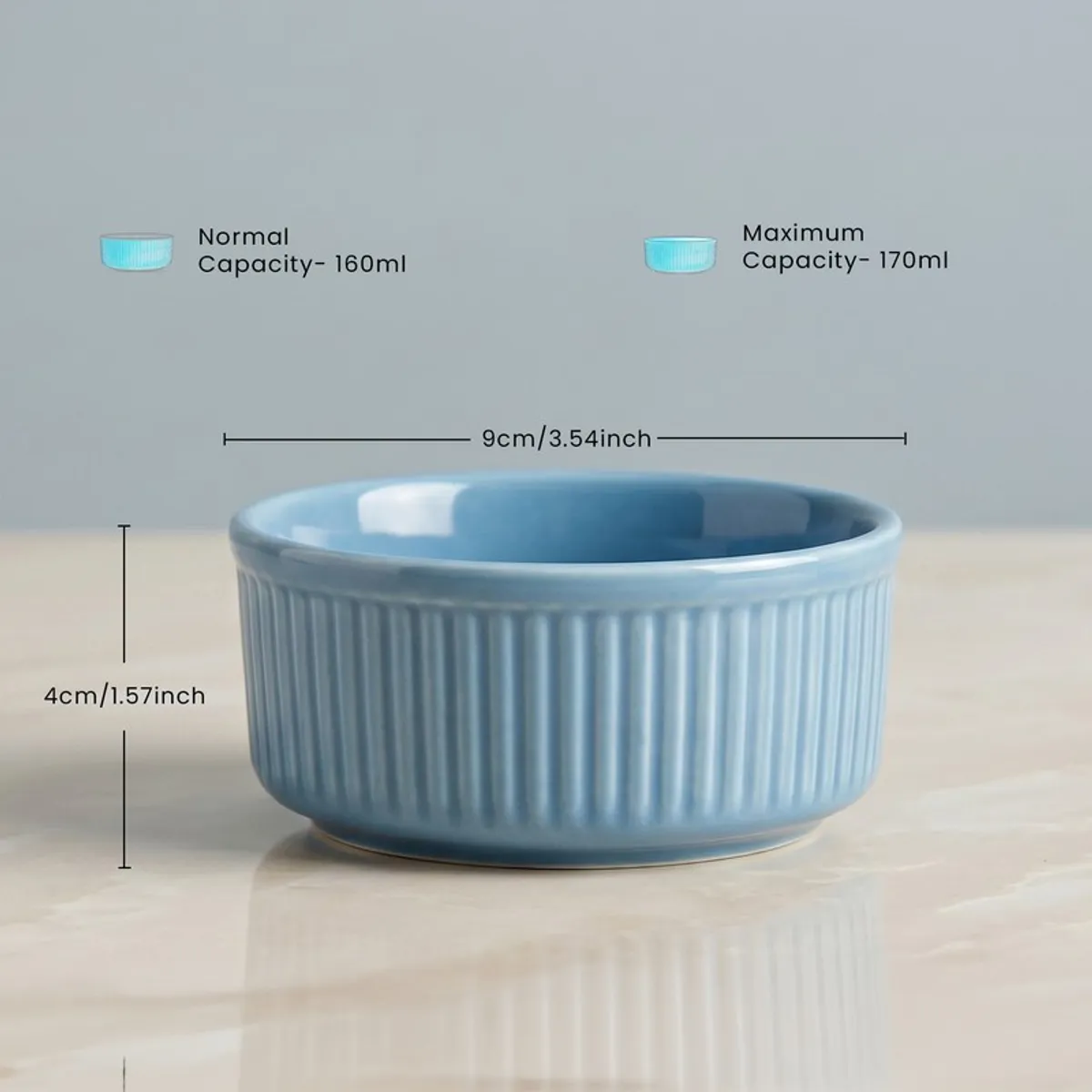Close-up of a blue ribbed snack bowl from the porcelain dinner set