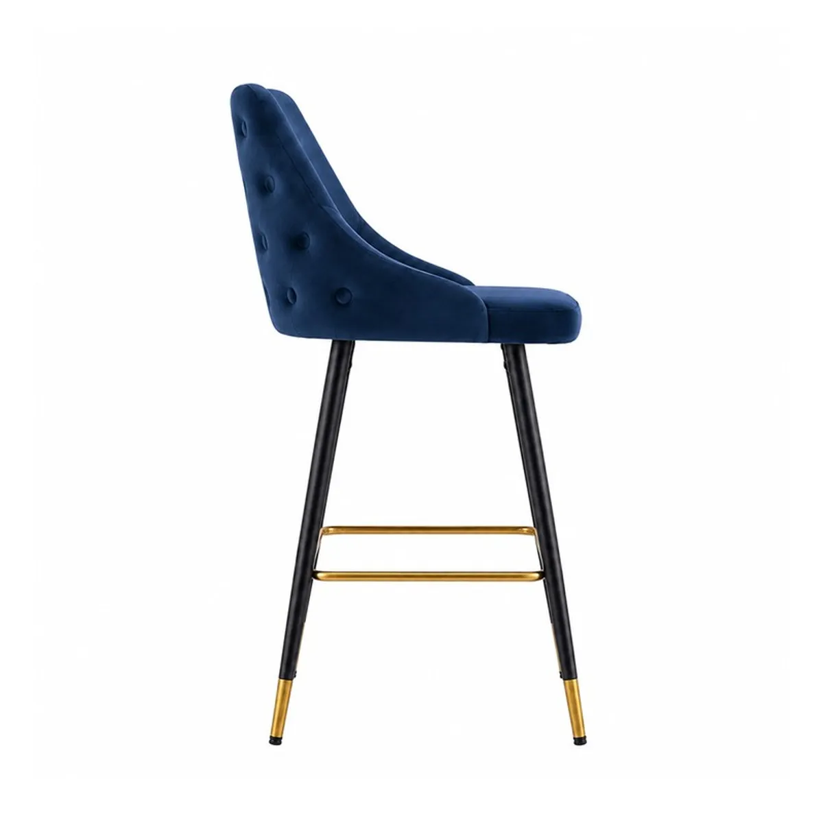 Side view of a blue velvet bar chair with tufted back and gold footrest