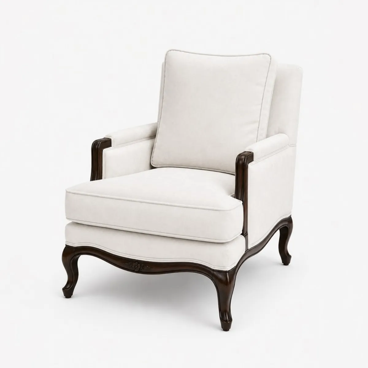 Angled view of a white lounge chair with dark wood frame details