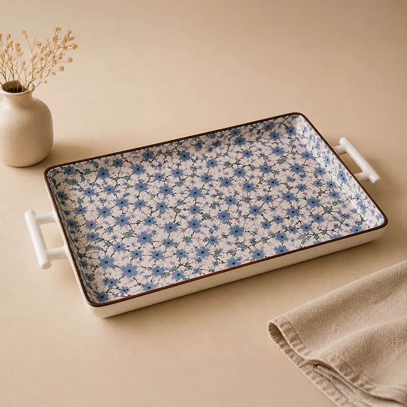 Empty rectangular floral ceramic serving tray with handles