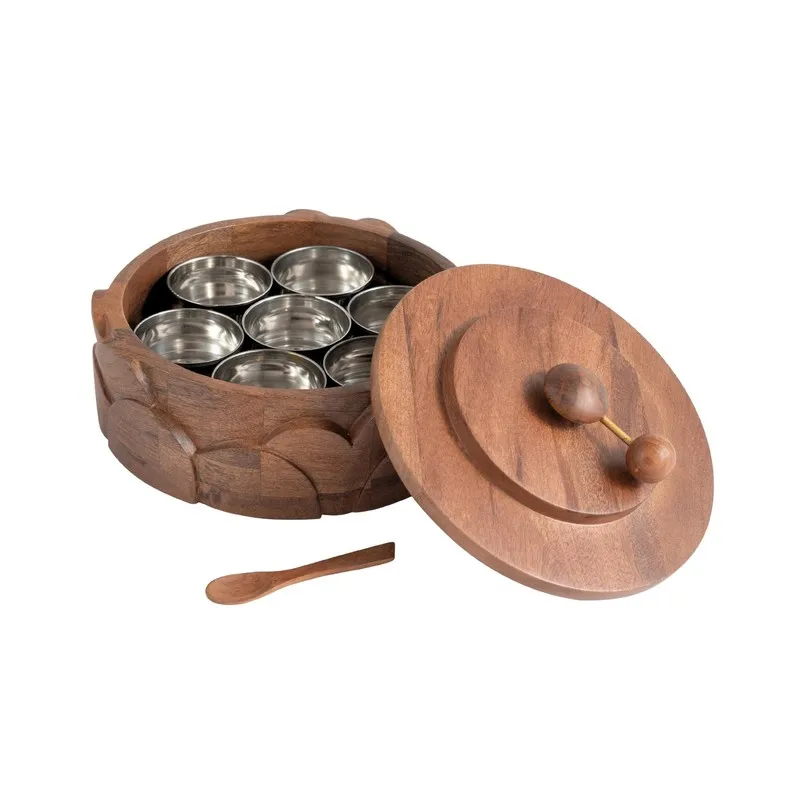 Open wooden masala box showing steel compartments, round lid and a small wooden spoon.