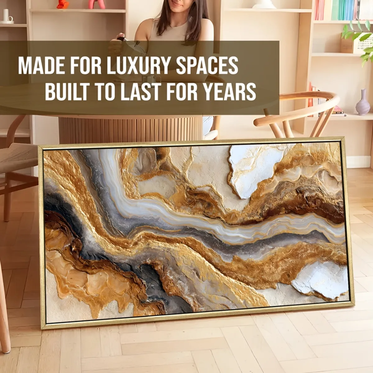 Large framed abstract canvas painting with flowing gold and grey bands