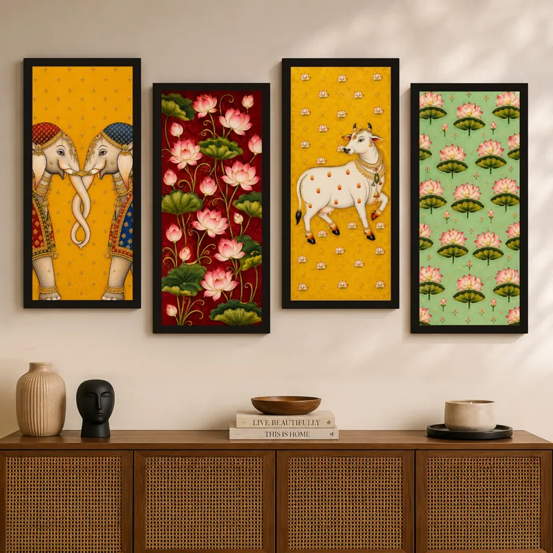 Four framed Pichwai paintings displayed above a wooden sideboard with decor accents.