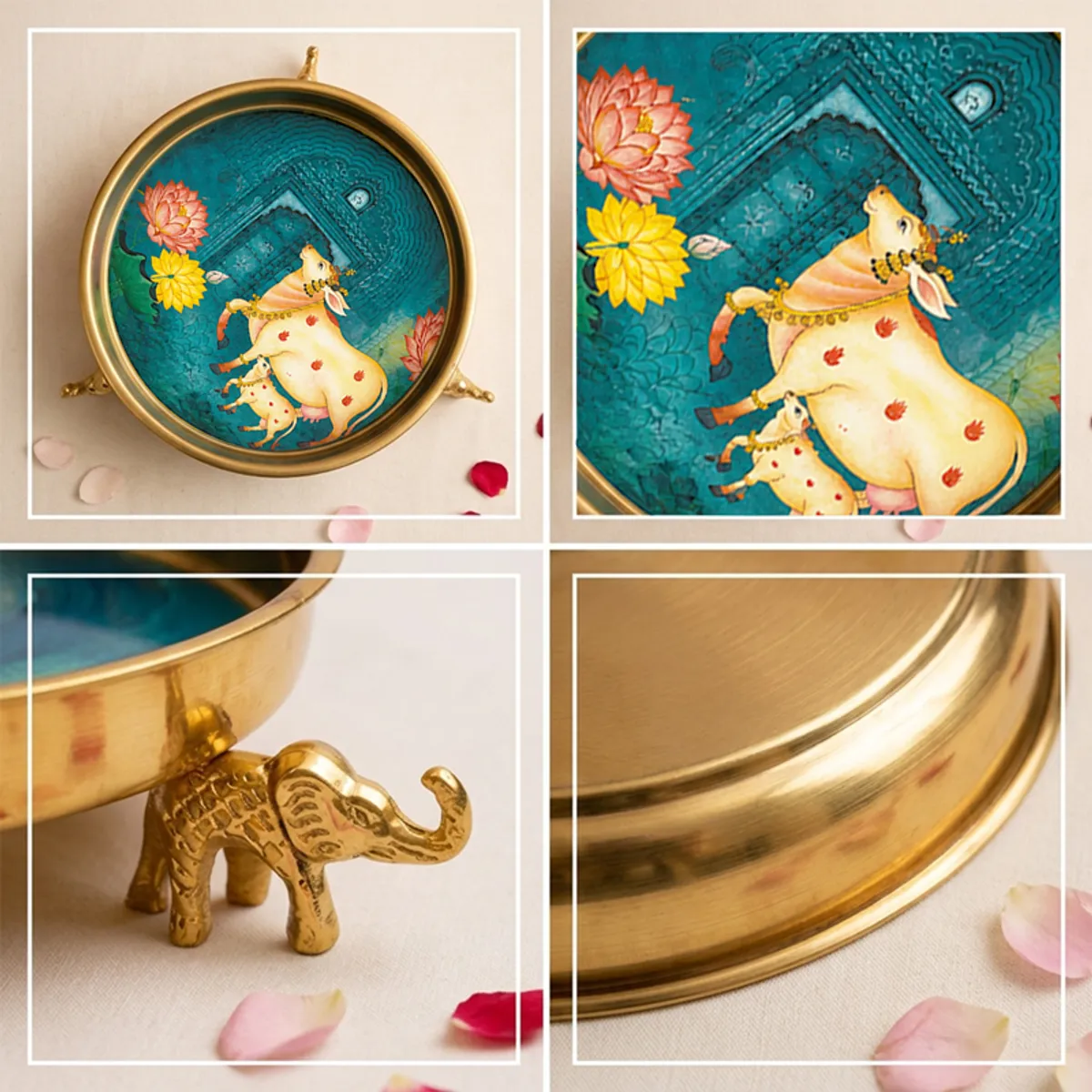 Close-up of a glossy metal urli with elephant artwork and sculpted elephant feet