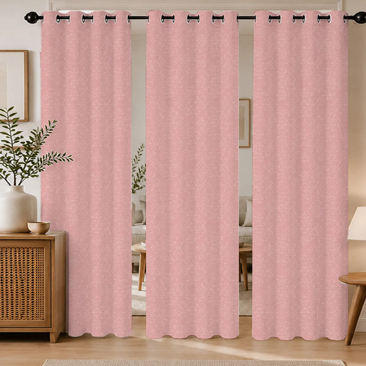 Set of three pink eyelet curtains with all-over damask-style motif