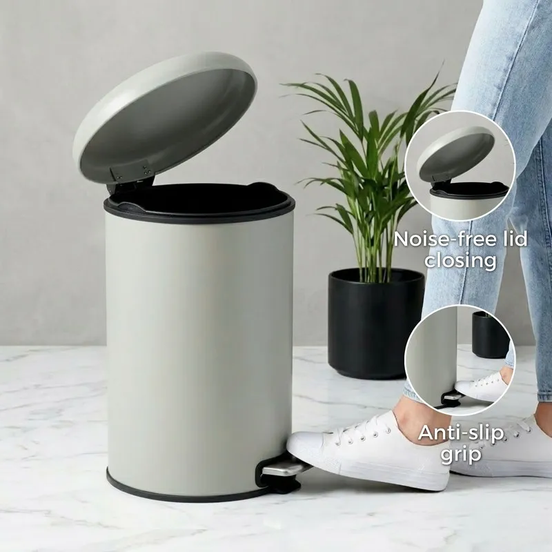 Beige pedal dustbin shown open with black inner rim