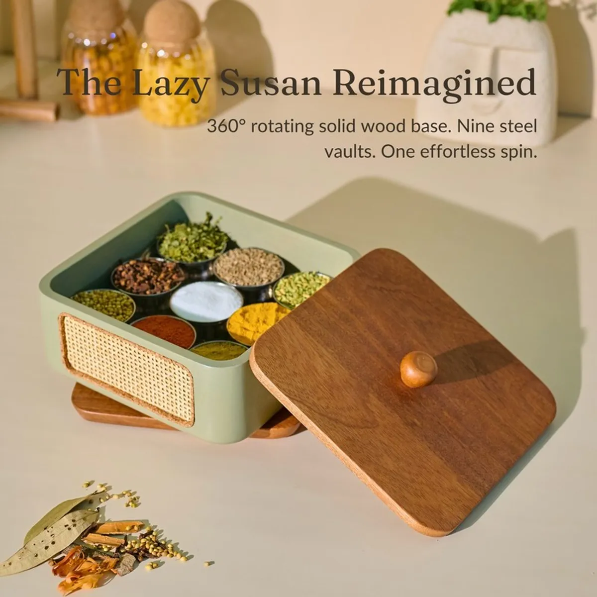 Open masala box showing spice compartments and a removable wood lid
