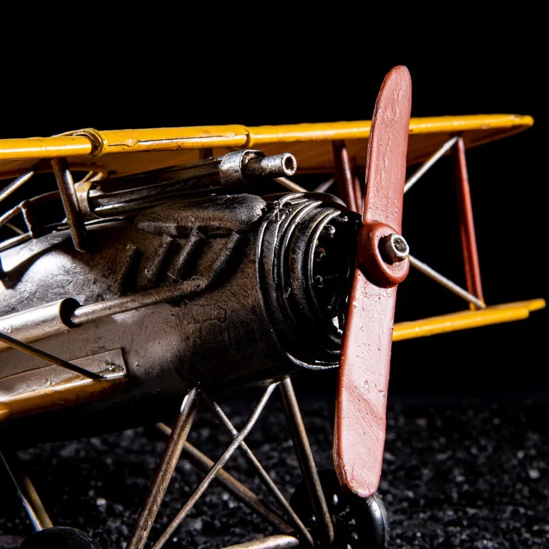 Close-up of the propeller and front body of the vintage plane showpiece