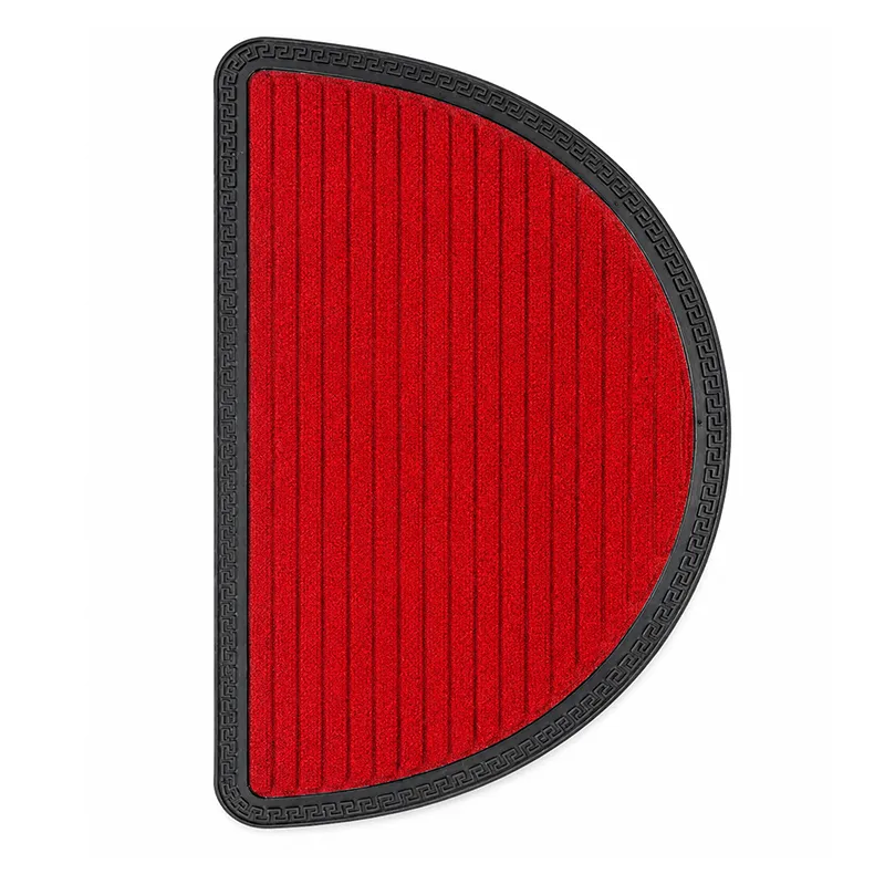 Red D-shaped door mat with black patterned rubber border on white background