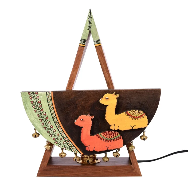 Studio view of multicolour wooden table lamp with alpaca motifs and hanging bells