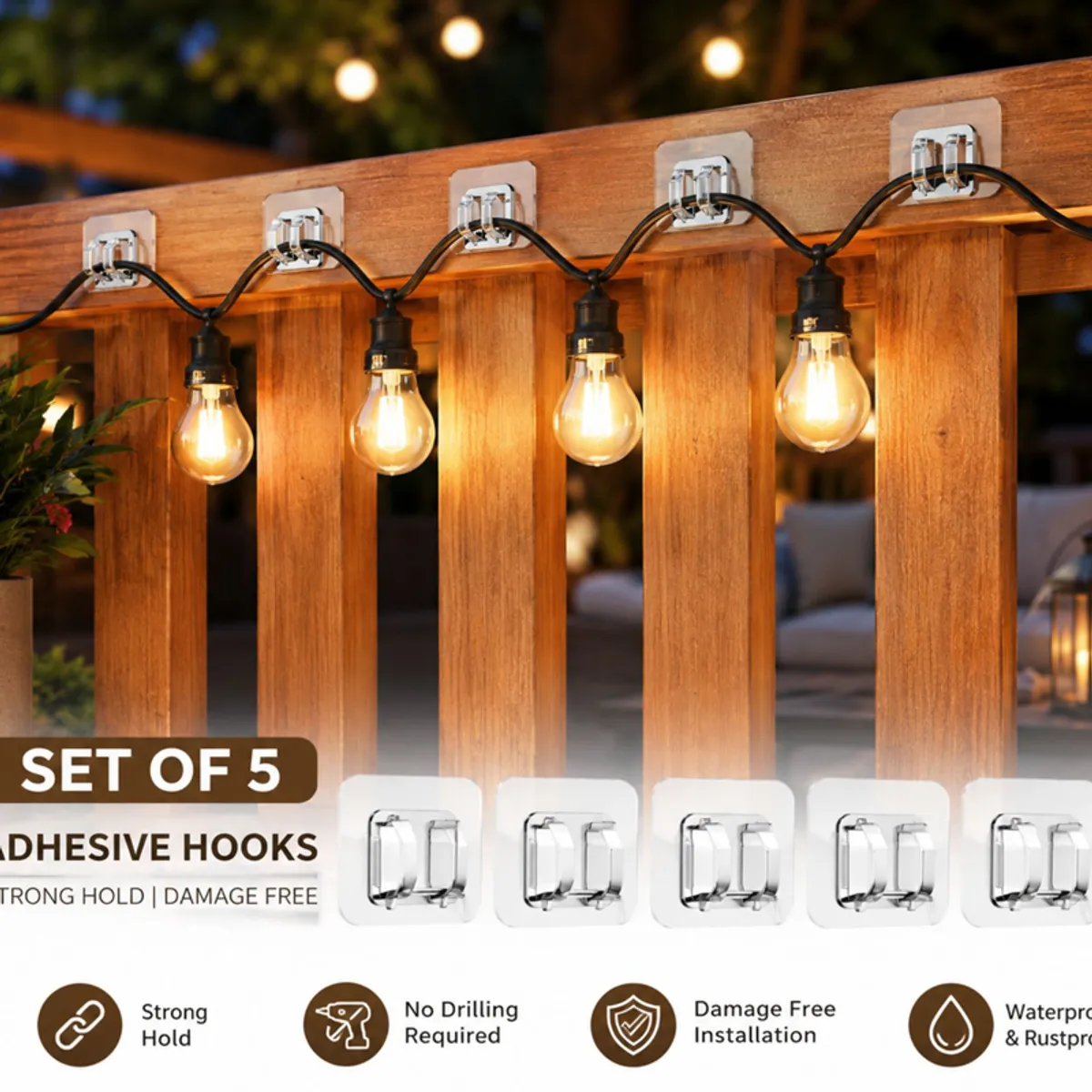 Set of transparent adhesive hooks displayed with string lights on railing