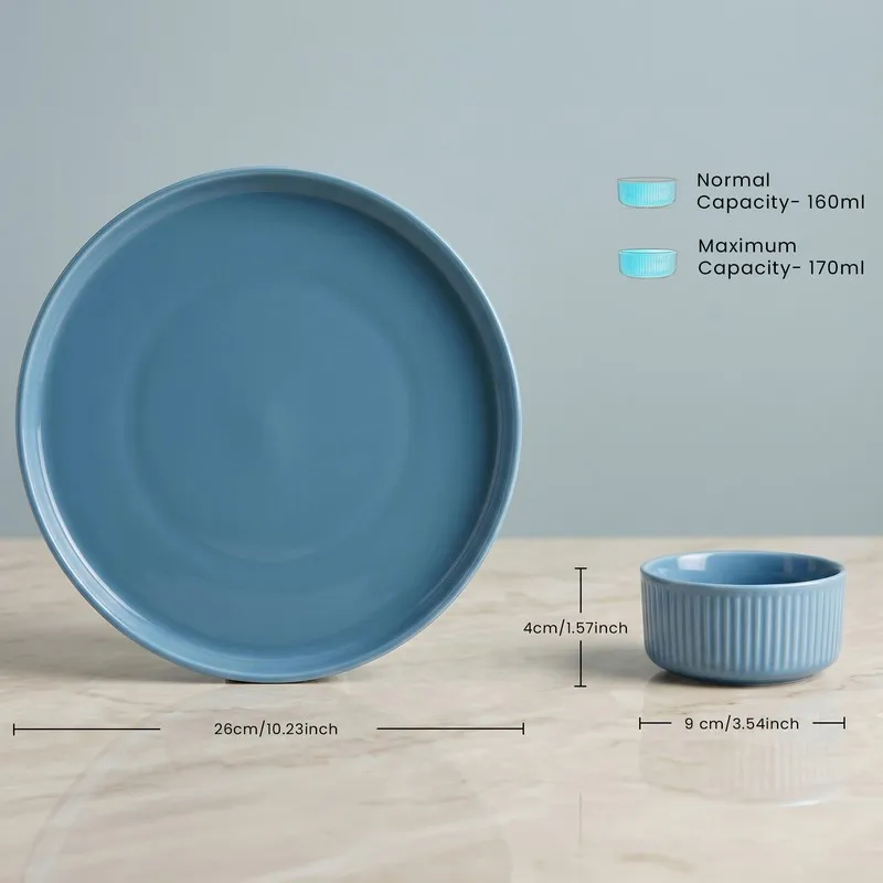 Blue round plate with matching ribbed bowl in close view