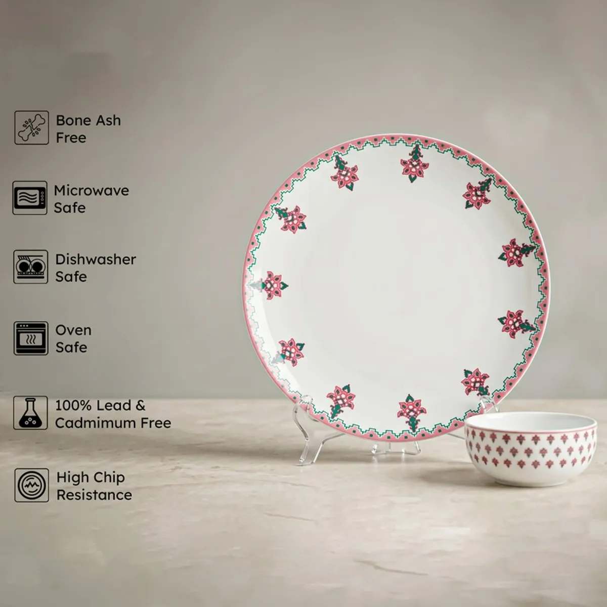 Pink and white floral dinner plate with matching bowl on display