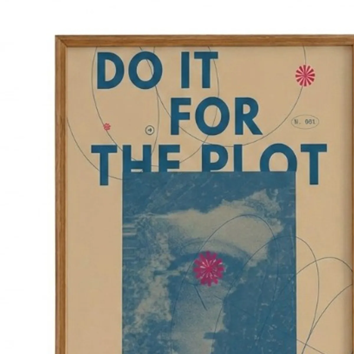 Close-up of framed blue and beige graphic wall art with bold lettering