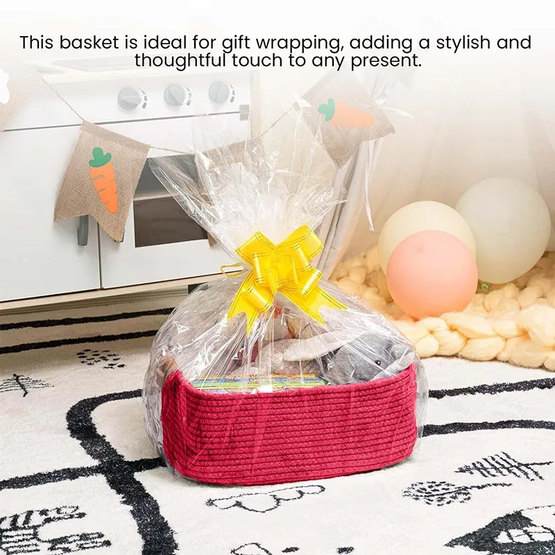 Dark pink basket used as a gift hamper base wrapped in clear cellophane