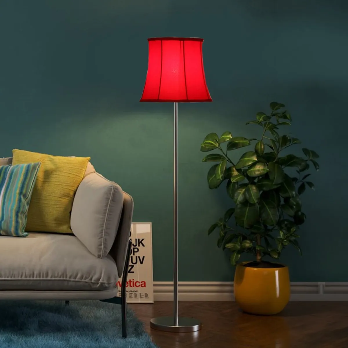 Red floor lamp glowing in a teal room beside a sofa and potted plant