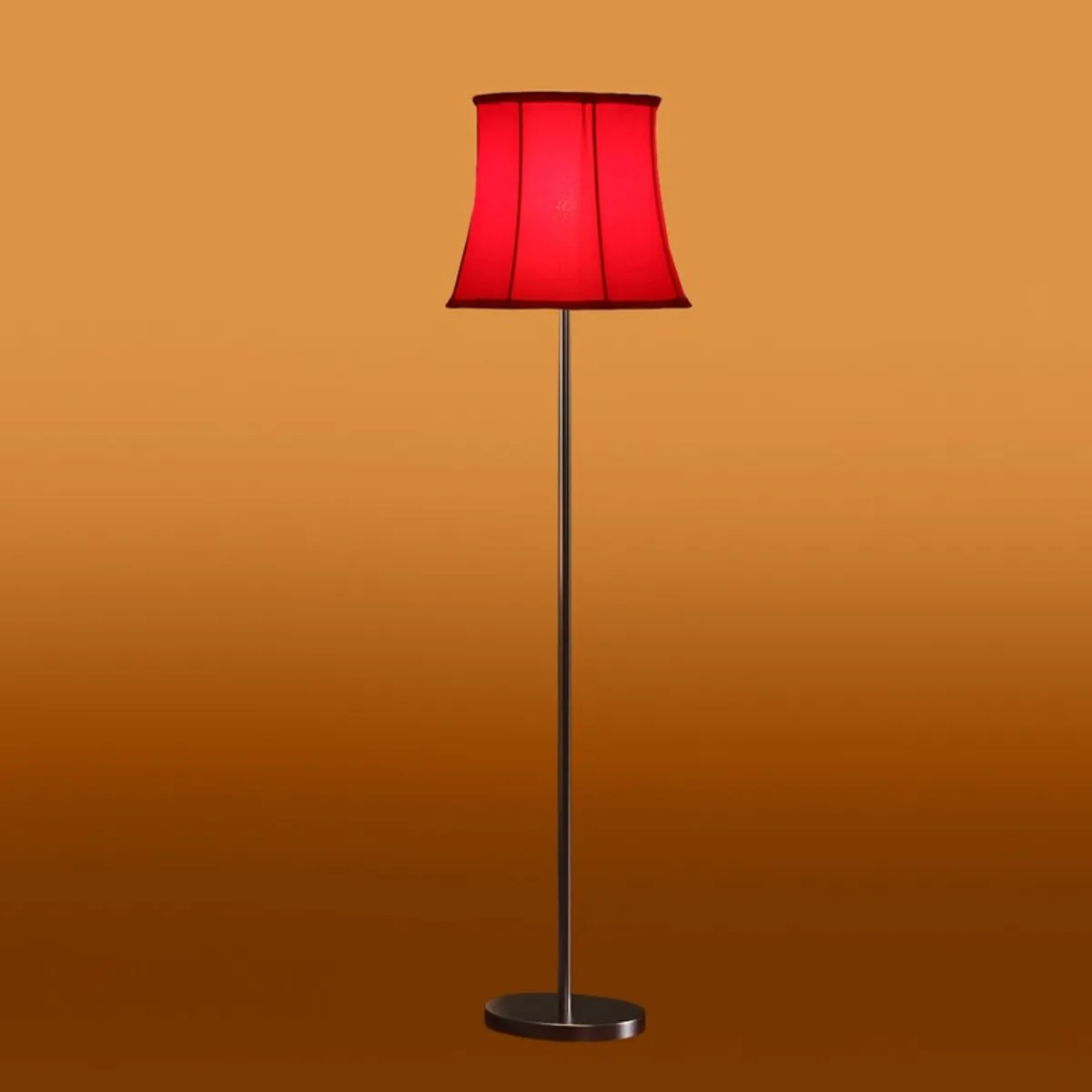 Red floor lamp with slim silver stand against an orange gradient background
