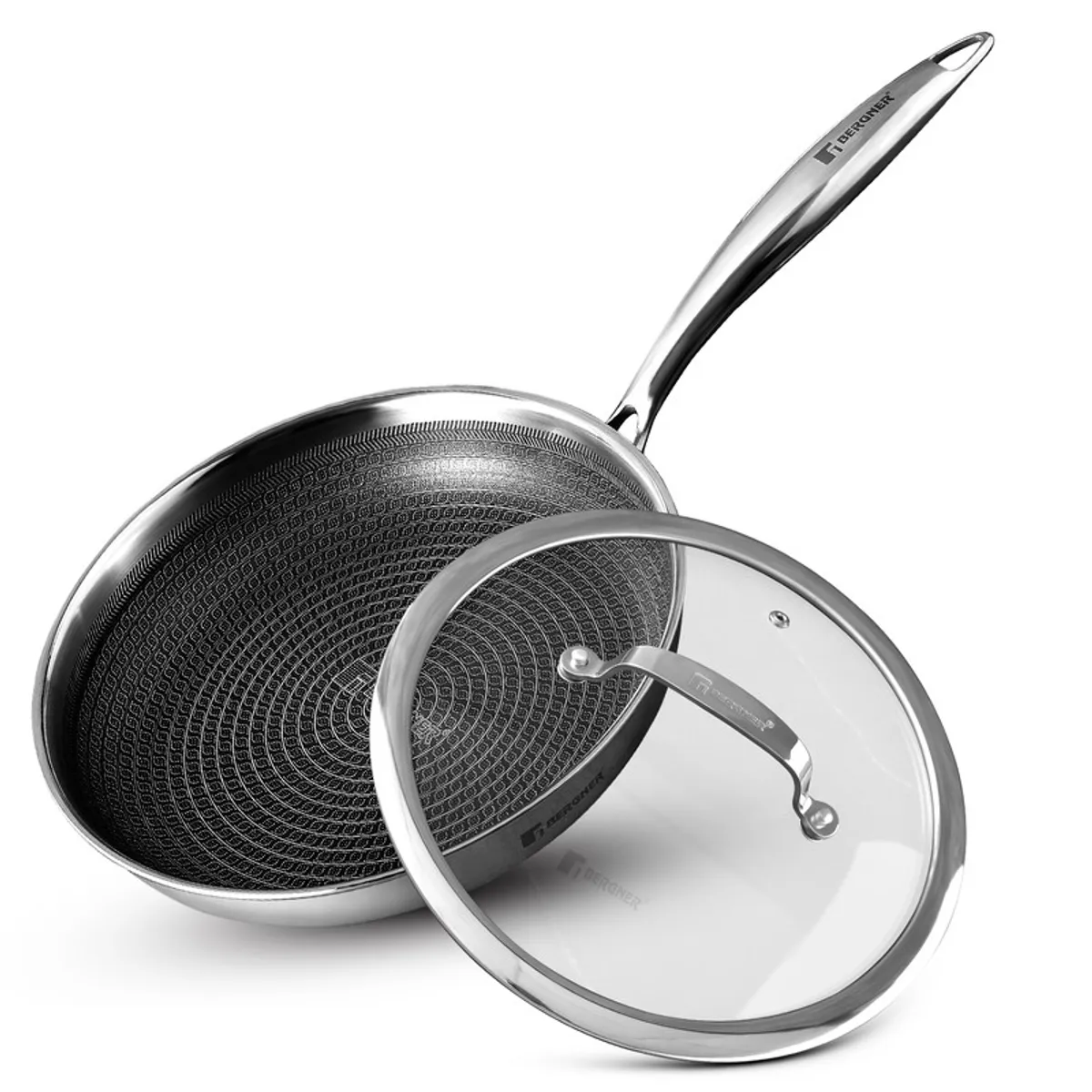 Silver frying pan showing its textured non-stick interior beside a glass lid