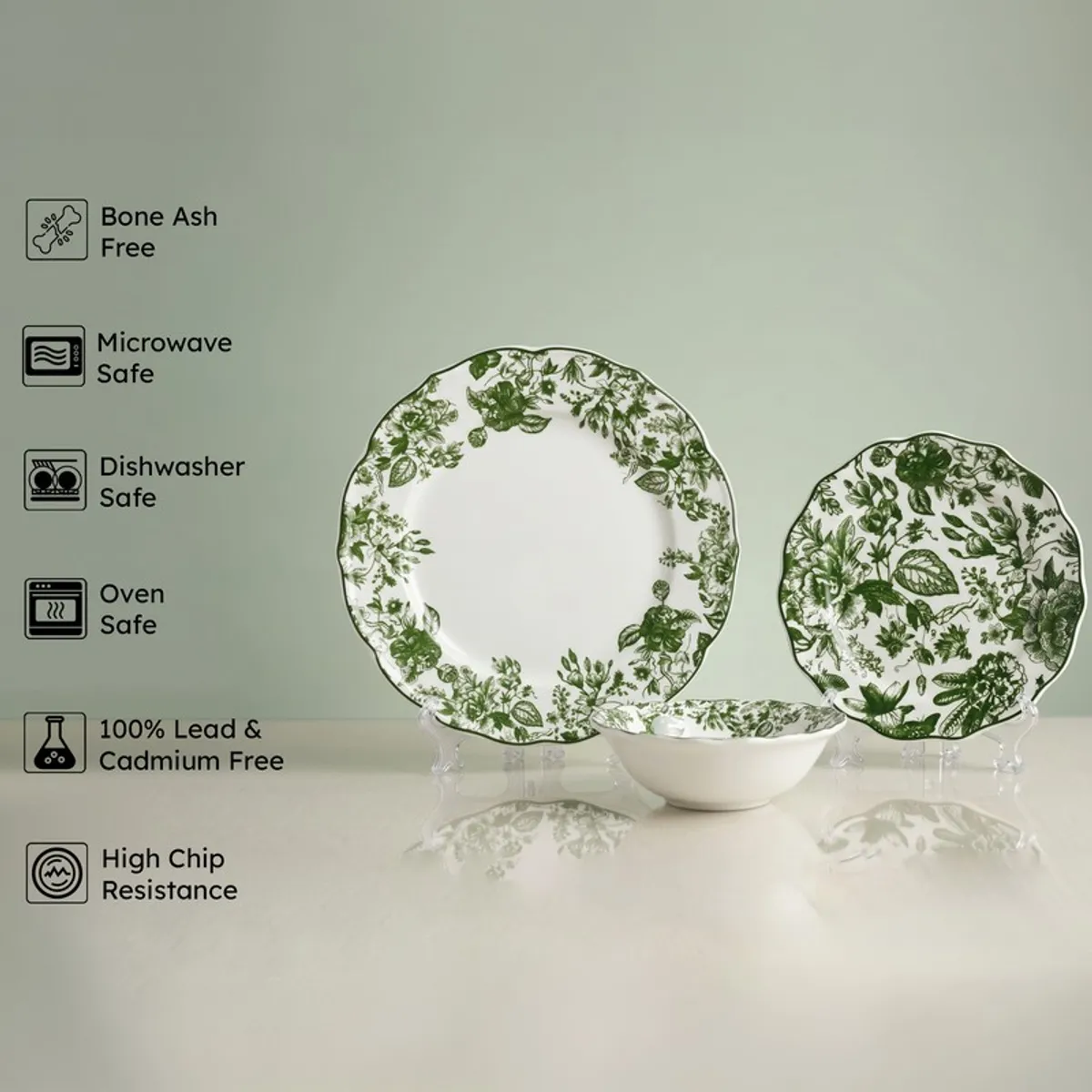 Green floral dinnerware set with plate, side plate and bowl on stands