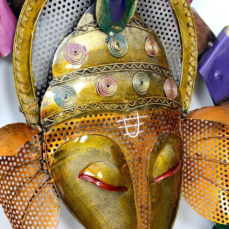 Close-up of the upper section showing textured gold metal detailing