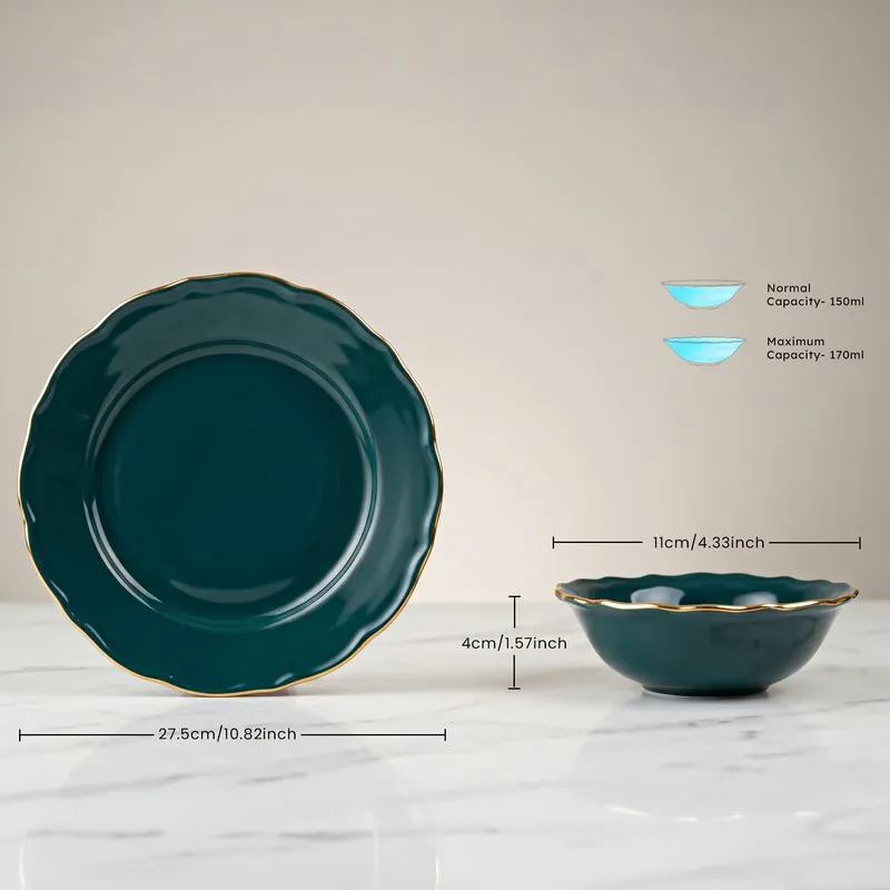 Dark teal plate and bowl with gold rim shown side by side