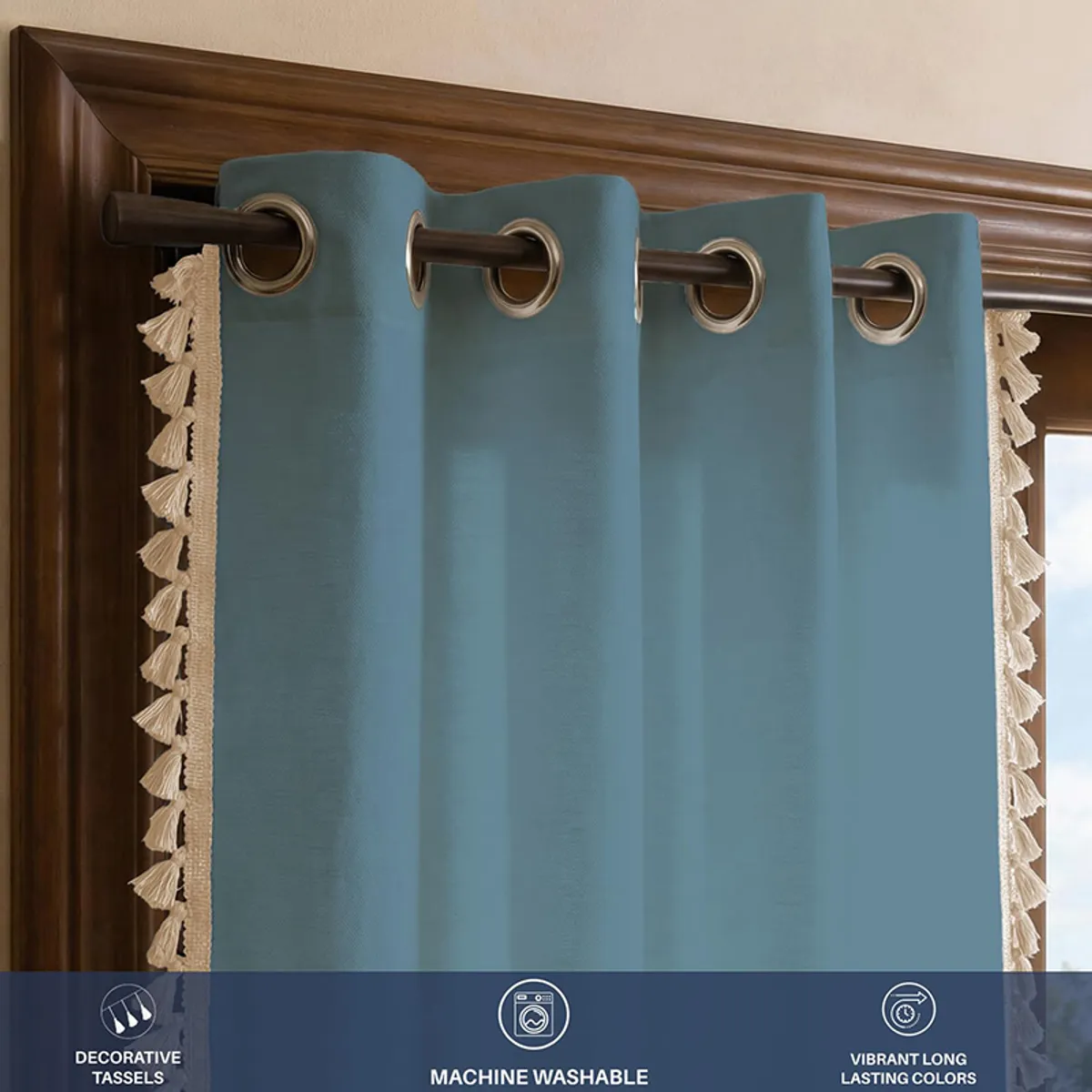 Blue curtain shown in a room with cotton and room-darkening feature graphics