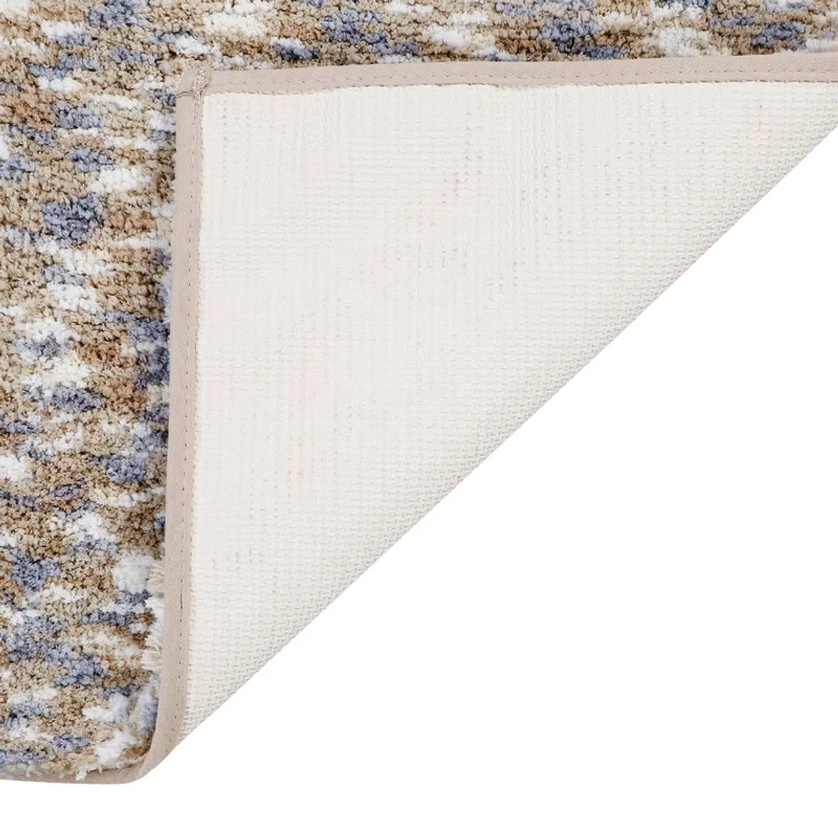 Close-up of the white anti-slip backing on the rectangular bath mat