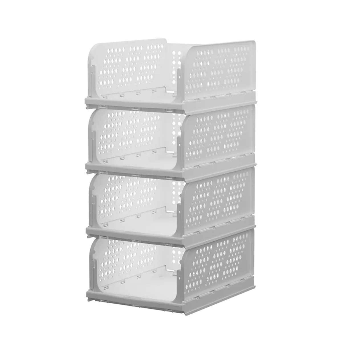 Four empty white stackable perforated organisers shown together
