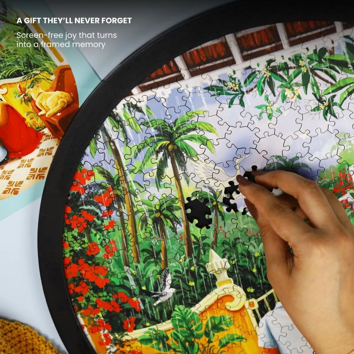 Close-up of a hand placing a puzzle piece into the tropical artwork
