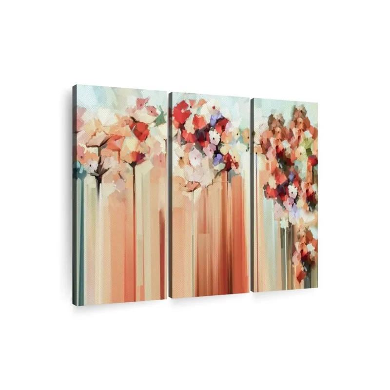 Angled view of three abstract floral gallery-wrapped canvas panels