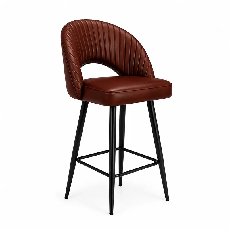 Angled view of brown ribbed bar chair with curved back and black metal legs