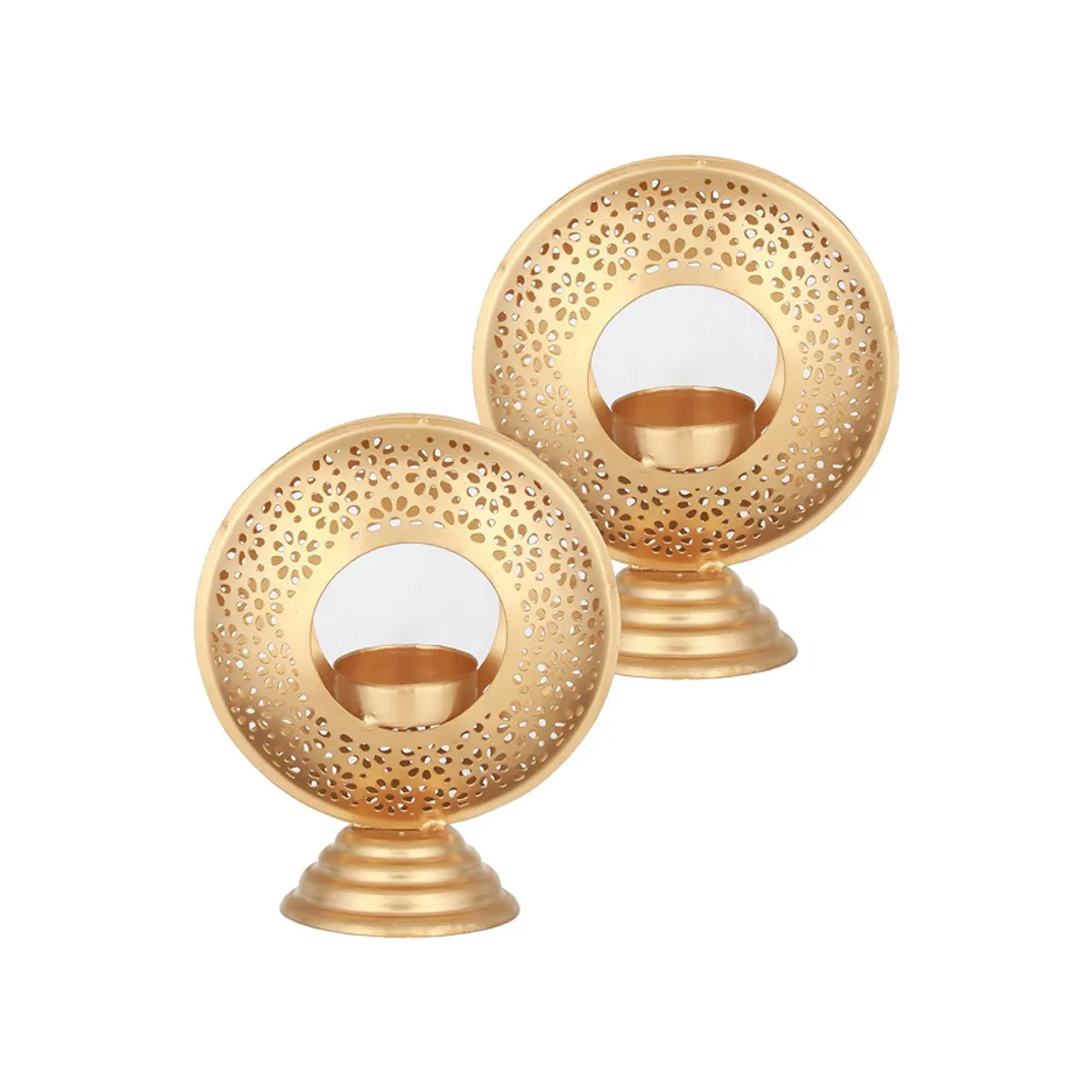Two gold circular tealight holders with ornate cut-out detailing