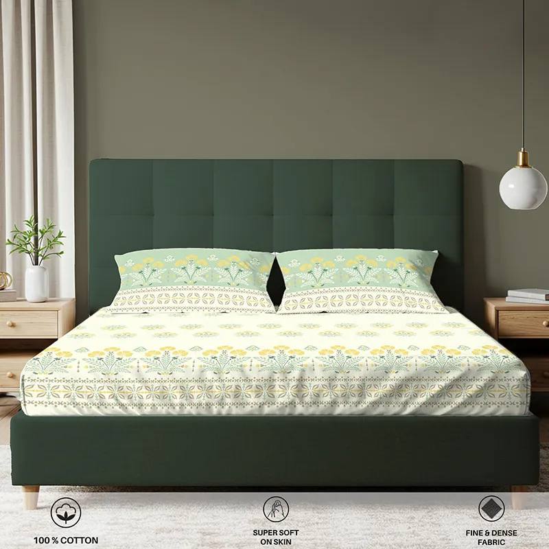 Front view of floral fitted bedsheet with matching printed pillow covers