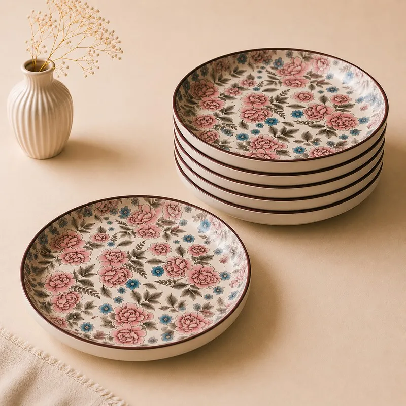 Stacked floral quarter plates with one plate placed in front