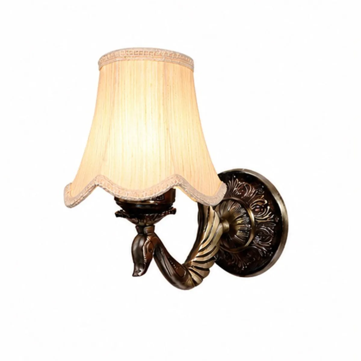 White cotton wall lamp with ornate dark gold-toned base on a white background