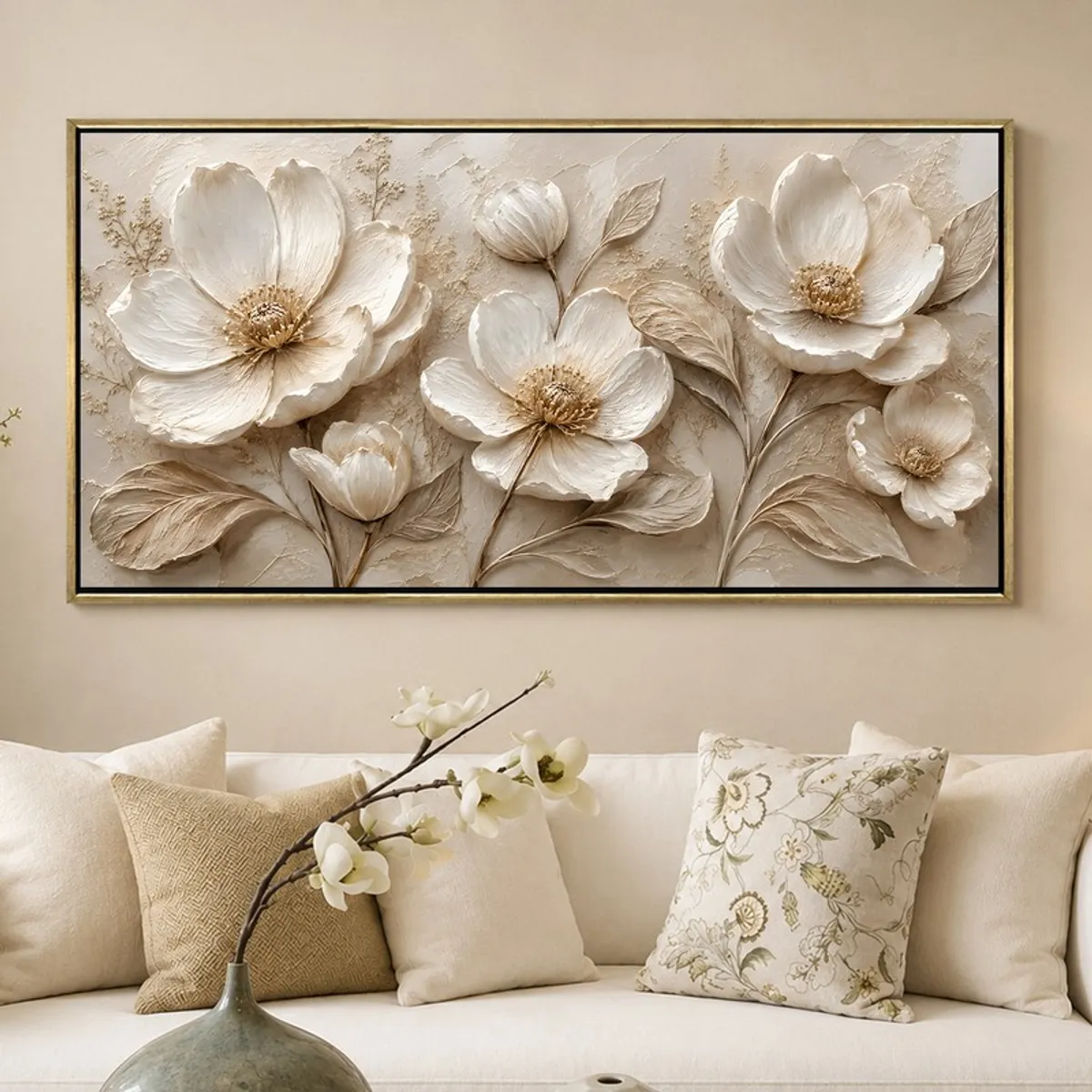 Large ivory floral wall painting with gold frame above a white sofa