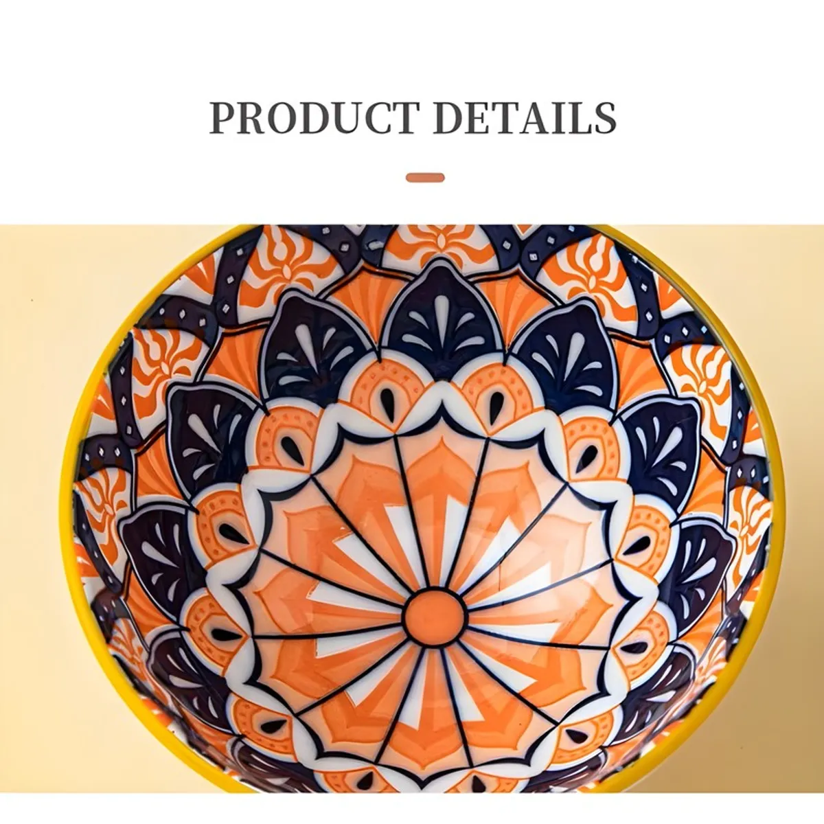 Close-up of a ceramic bowl showing an intricate orange, blue and white mandala pattern.