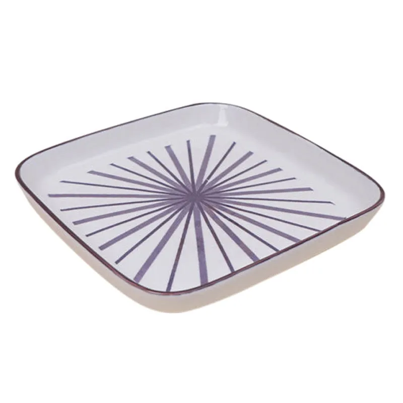 Single square white snack plate with purple burst pattern on white background