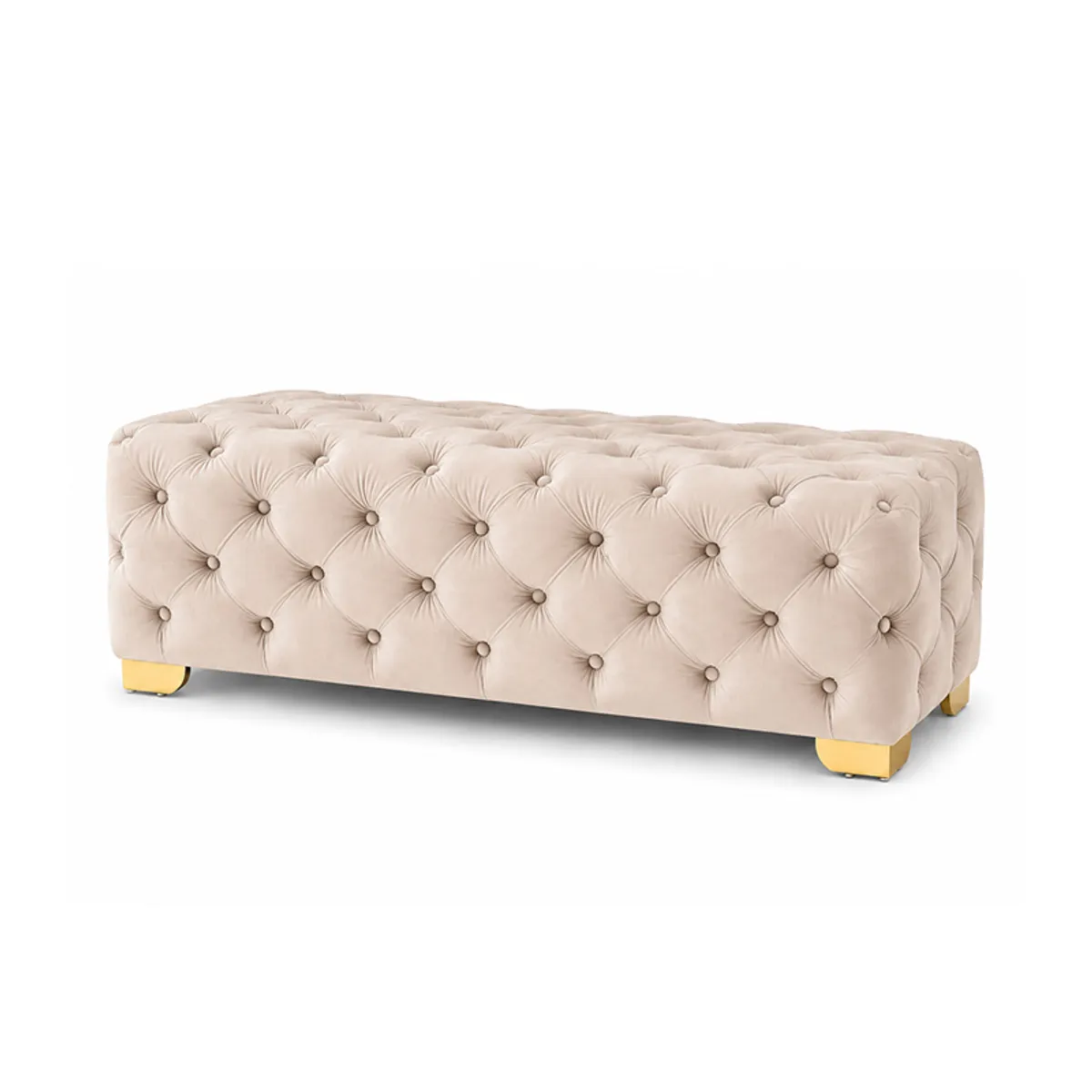 Angled view of a beige velvet tufted bench showing its rounded corners and gold legs.