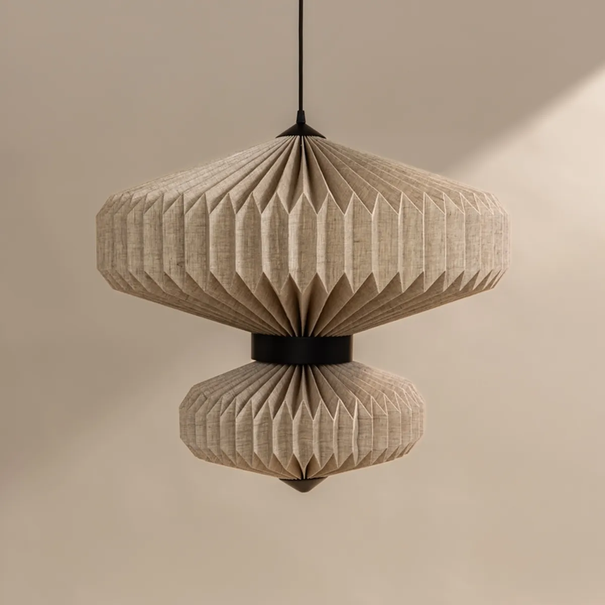 Unlit beige two-tier pendant ceiling lamp with black hanging cord