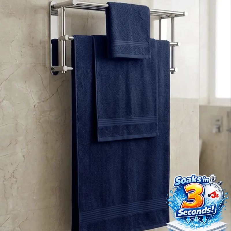 Navy towels displayed on a bathroom rack