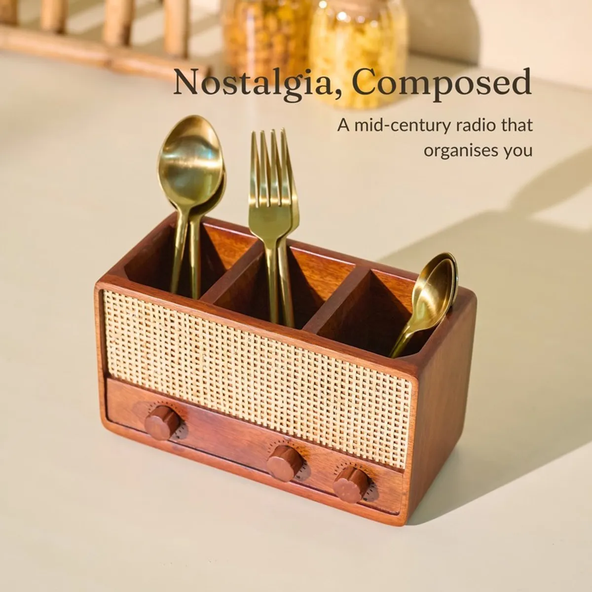 Wooden cutlery stand with woven panel and knob details holding cutlery