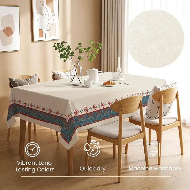 Off-white printed table cover with decorative border in dining room
