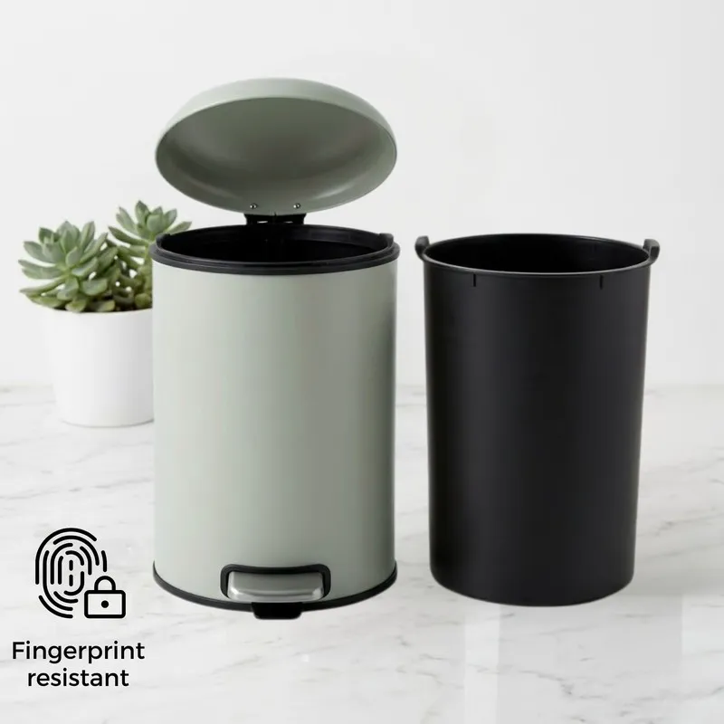 Beige dustbin with lid open beside removable black inner bucket